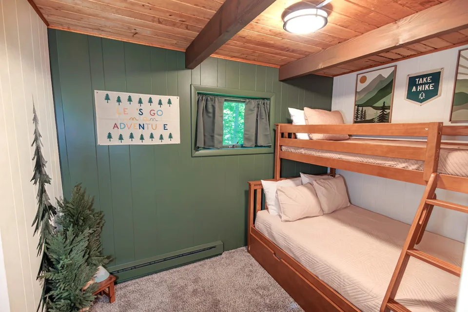 Bunk room with a twin-over-full bed and twin trundle